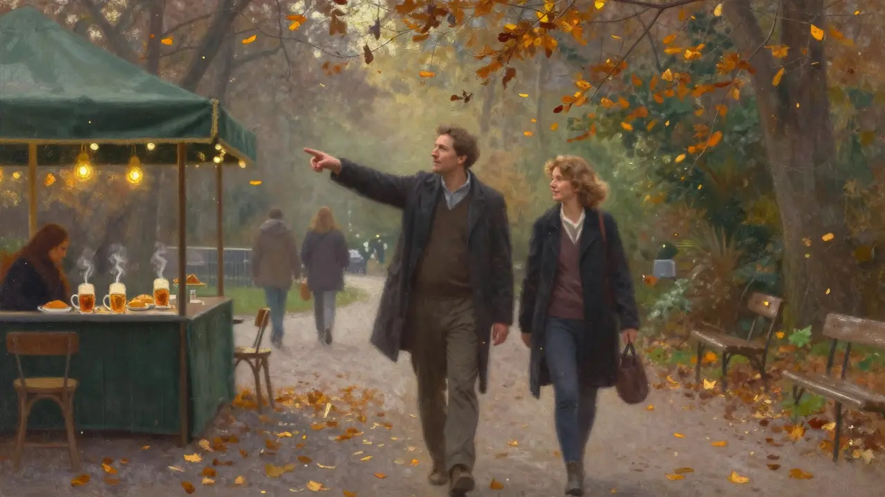 Two people walking peacefully along the Englischer Garten in Munich during autumn evening.
