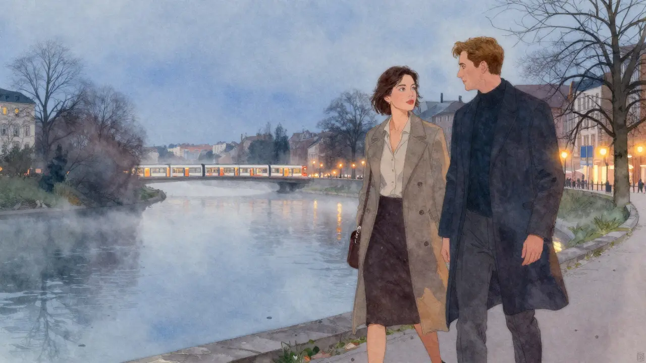 Two people walking peacefully along the Isar River at dusk, the English Garden in the background.